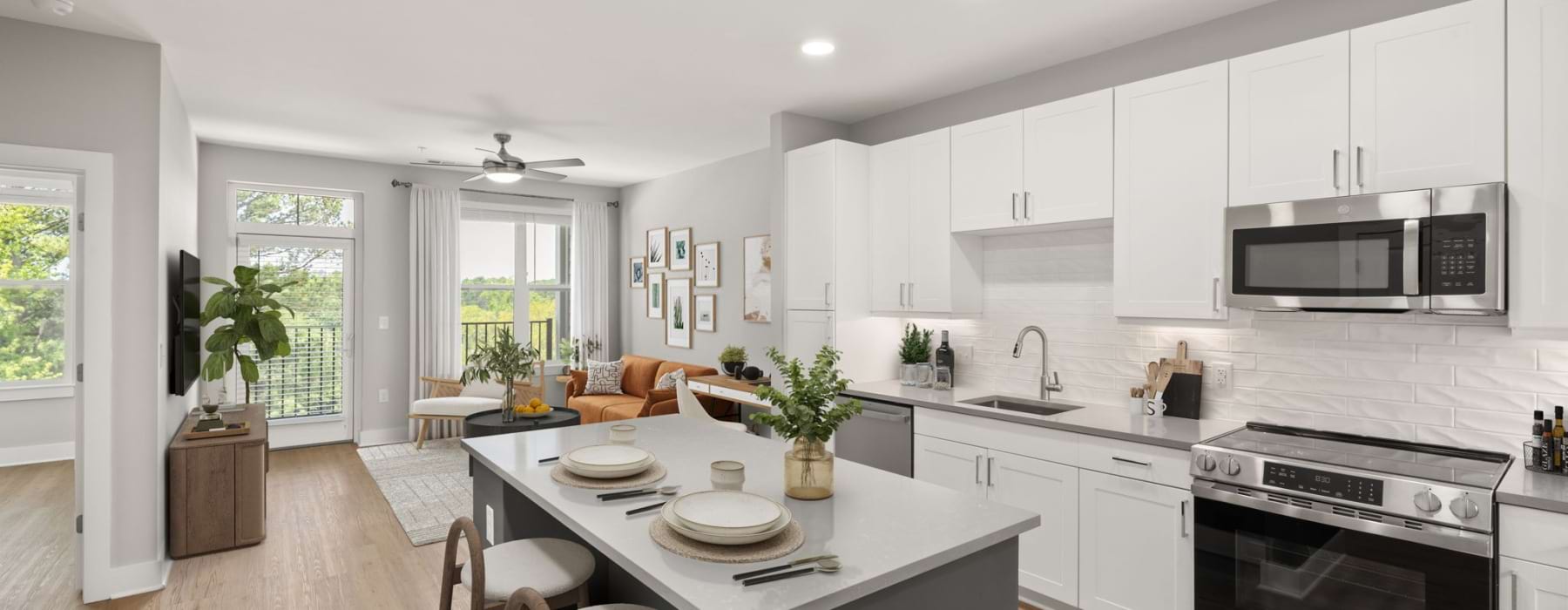 a kitchen with white cabinets