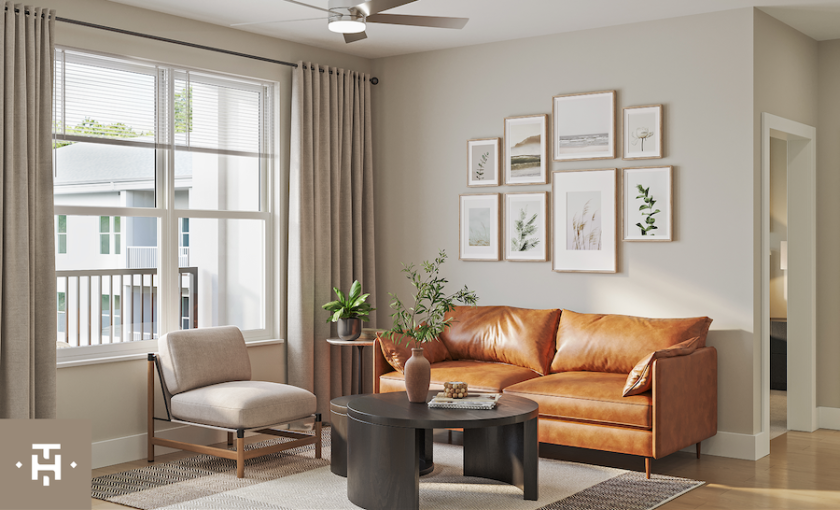 a living room with a couch and a table