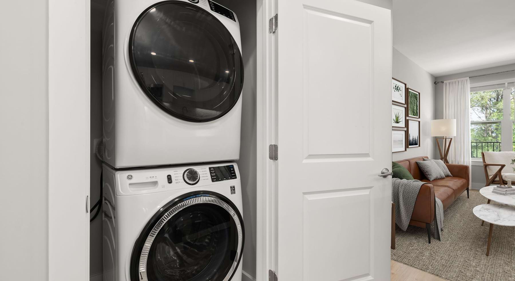 stackable washer and dryer in a closet